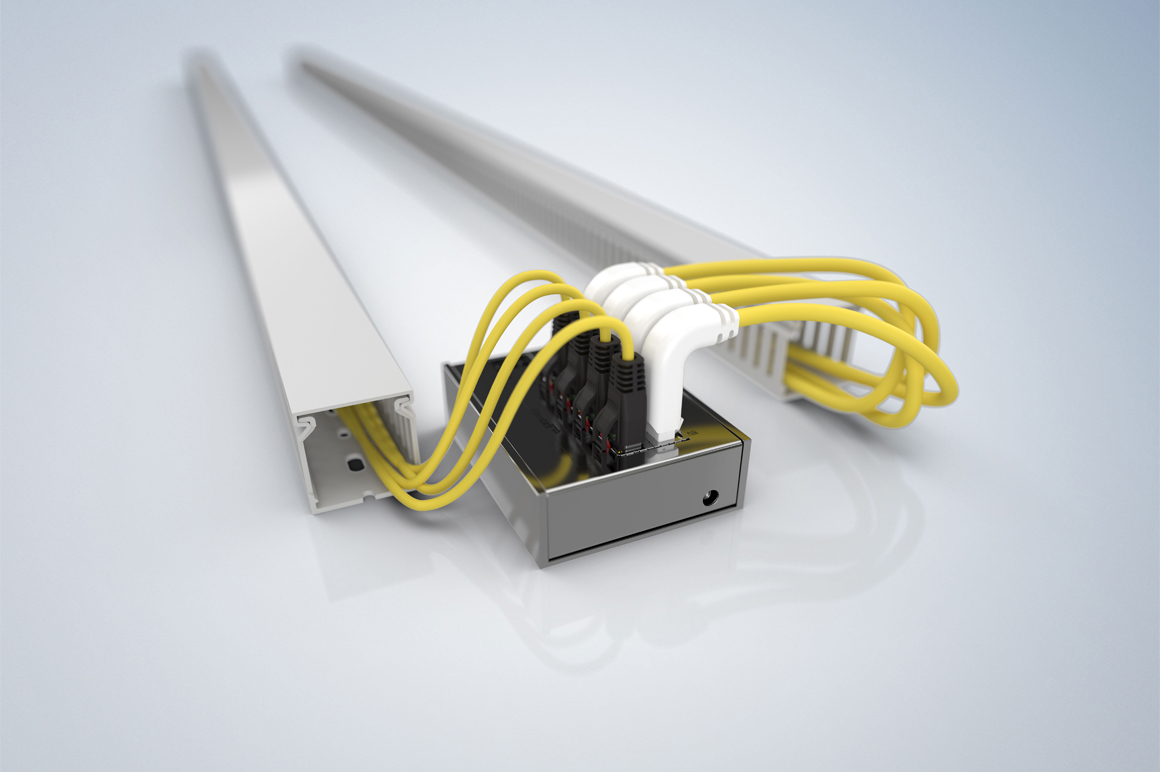 On the left, you can see that the outlet angle is flat thanks to the tight bending radius on the ZK1093-9191-Cxxx. The standard angled RJ45 plugs are shown on the right-hand side for comparison.